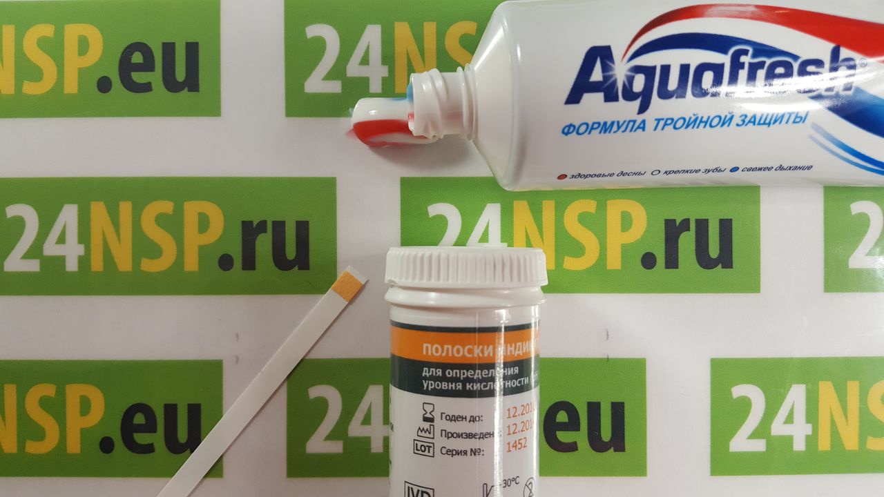 Упаковка pH-полосок и pH-полоска для проведения теста зубной пасты